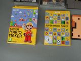 two video games are sitting on a table next to each other