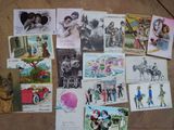 a lot of postcards that are on the floor