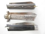 three different types of knives on a white surface