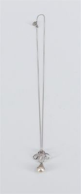 silver plated earrings with a flower on a long silver chain