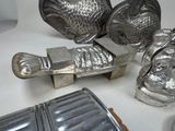 a lot of metal items that are on a table