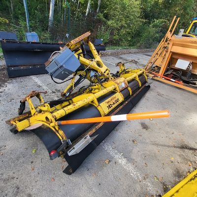 a yellow machine that is laying on the ground