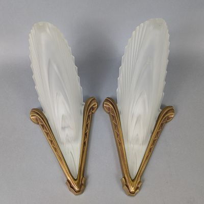 pair of art deco sconces in the form of a pair of wings