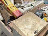 a box full of assorted items sitting on the floor