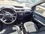 a picture of a car dashboard with a steering wheel