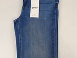 the back of a pair of blue jeans with a tag on it