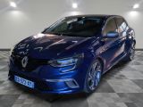 a picture of a blue car in a showroom