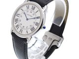 a watch with roman numerals on a black leather strap