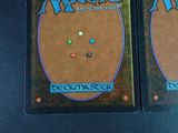 two decks of the card game magic the gathering on the table