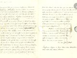 un vieux manuscrit sur lequel figure une lettre manuscrite et l'image d'un oiseau