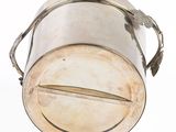 an old metal container with a handle on a white background