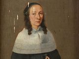 portrait of a woman in a black dress with a white collar and a black and white dress