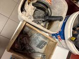 boxes of tools are stacked on top of each other in a room