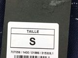 the label on the back of a blue jacket with a barcode on it