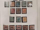 an image of a picture of a collection of stamps on display
