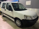 a white van that is parked in a garage