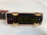 a small toy train that is sitting on a table