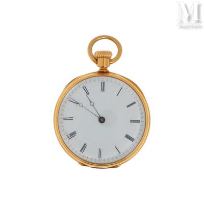 une montre de poche en or avec des chiffres romains sur le cadran