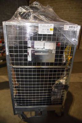 a metal cage with a bunch of items in it