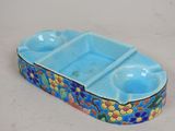 an image of a blue and yellow flowered dish
