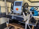 a machine that is sitting on a pallet in a garage