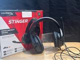 a box with a pair of headphones sitting on a table