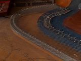 a close up of a musical instrument on a table