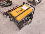 a small generator that is sitting on the floor