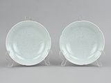 pair of chinese white porcelain dishes on stand
