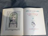 an open book with a picture of a woman in a dress
