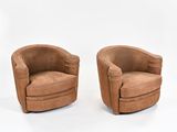 pair of mid - century style swive chairs in tan leather, france, circa