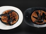 two helmets that are sitting on top of each other