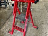 an image of a red work stand in a workshop