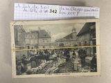 une photo d'une carte postale représentant un marché