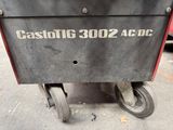 a black and red cart sitting on the street