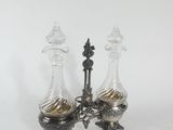 pair of antique silver plated glass decanters on stand