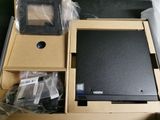 a box with a laptop inside of it sitting on a table