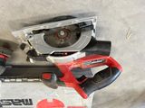 two circular saws and a circular cutter sitting on a box