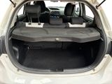 a trunk of a car with the back seats folded down