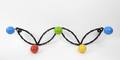a close up of a pair of beads on a white surface