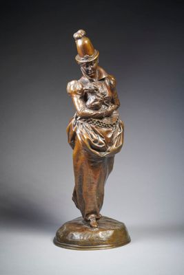bronze statue of a woman carrying a child on her back