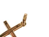a gold cross on a white background with a white background