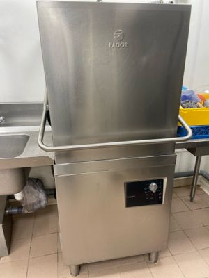 an image of a stainless steel sink in a commercial kitchen