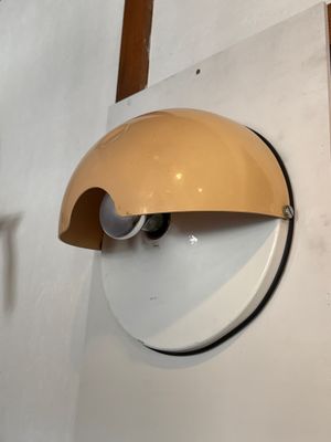 a light that is on the wall next to a clock