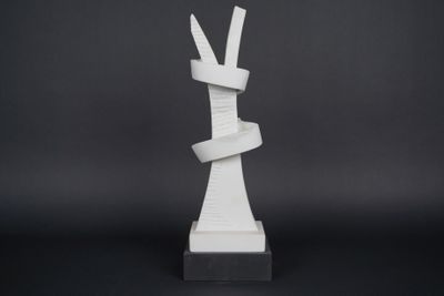 a white sculpture of a rabbit made out of paper on a black background