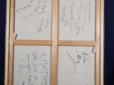 a picture of a easel with a lot of writing on it