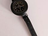 an image of a watch sitting on top of a white surface