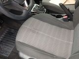 the interior of a car with a steering wheel and a dashboard