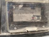 a close up of an electronic meter on a table