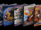 a lot of pokemon cards on display in a row